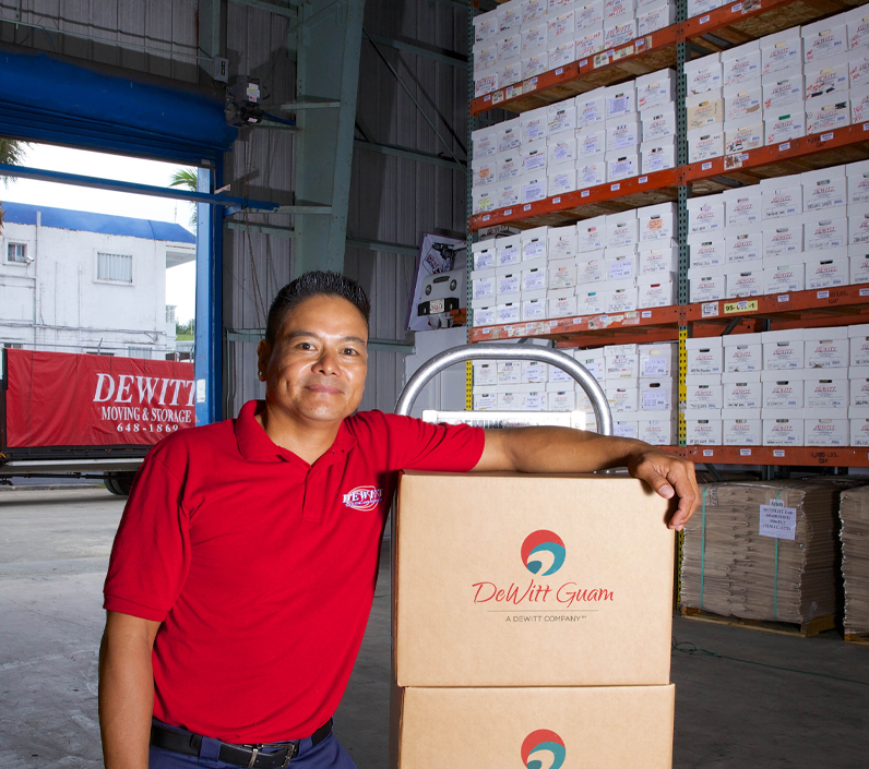 warehouse-worker-standing-boxes-6-cs-right mover with boxes