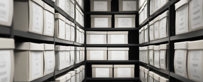 documents stacked in boxes