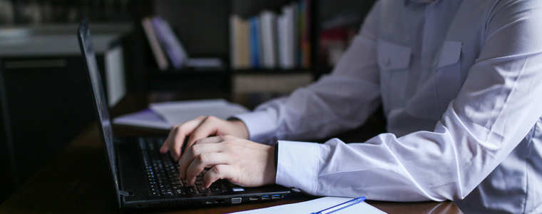 man working on laptop