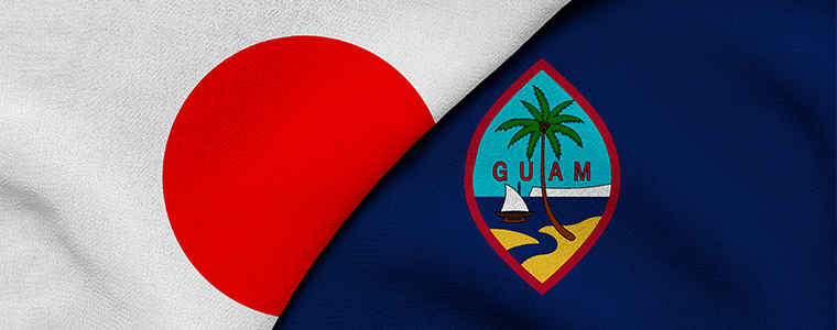 Guam and Japan flags folded next to each other