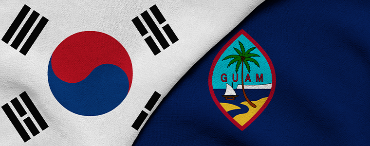 Korea and Guam flags folded next to each other