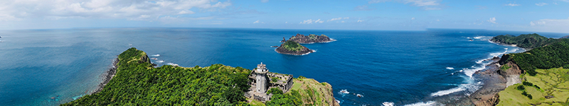 Philippines Moving Internationally image aerial drone panorama of palaui lighthouse phillipines