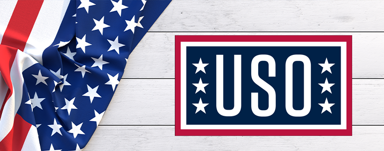 American flag on wood background with USO logo